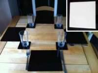 A photo of Set of 4 Perspex Place Mats and Coasters (White)